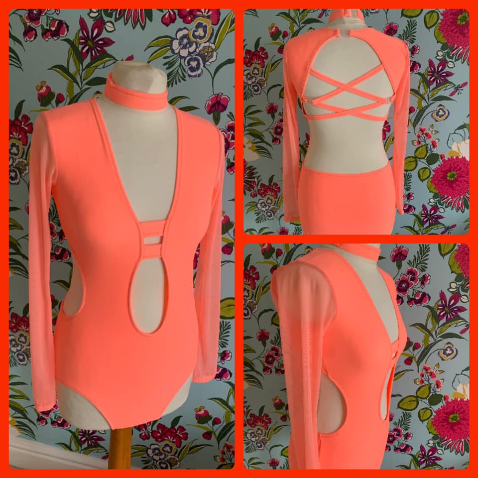 Leotard with cutout front and mesh sleeves